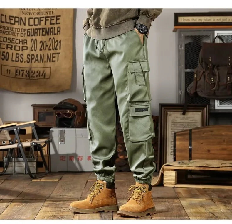 2025 New Men Casual Pants Autumn Multi Pocket Sports Pants Khaki Black Green Elastic Waist Pants M-4XL