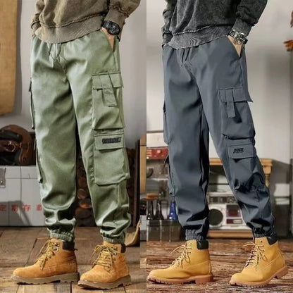 2025 New Men Casual Pants Autumn Multi Pocket Sports Pants Khaki Black Green Elastic Waist Pants M-4XL