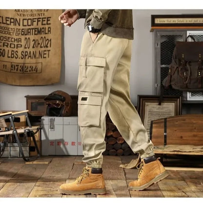 2025 New Men Casual Pants Autumn Multi Pocket Sports Pants Khaki Black Green Elastic Waist Pants M-4XL