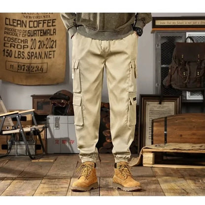 2025 New Men Casual Pants Autumn Multi Pocket Sports Pants Khaki Black Green Elastic Waist Pants M-4XL