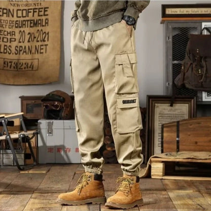 2025 New Men Casual Pants Autumn Multi Pocket Sports Pants Khaki Black Green Elastic Waist Pants M-4XL