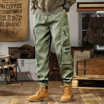 2025 New Men Casual Pants Autumn Multi Pocket Sports Pants Khaki Black Green Elastic Waist Pants M-4XL