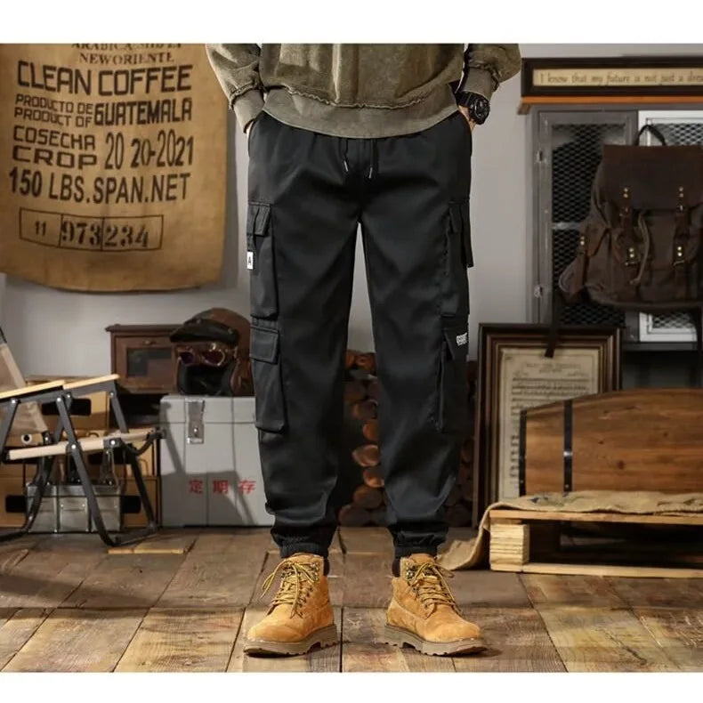 2025 New Men Casual Pants Autumn Multi Pocket Sports Pants Khaki Black Green Elastic Waist Pants M-4XL